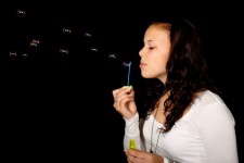 Girl Blowing Bubbles