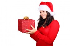 Santa Looking At Gift