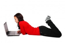 Woman Lying With Laptop
