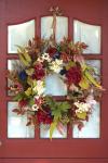 Floral Wreath On A Red Door
