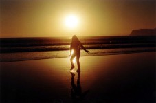 Woman On Coronado Beach At Sunset
