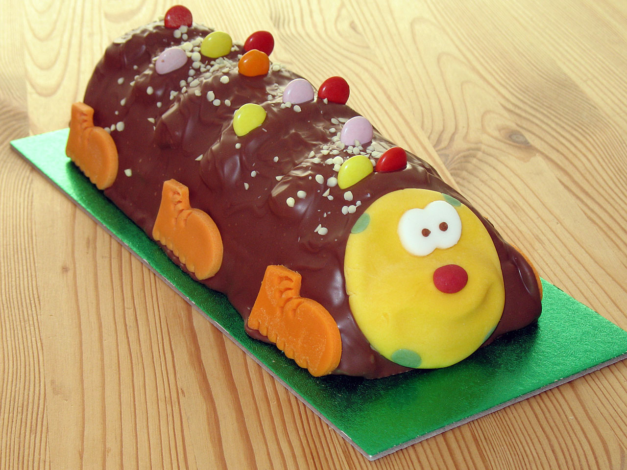 Children's chocolate cake in caterpillar shape