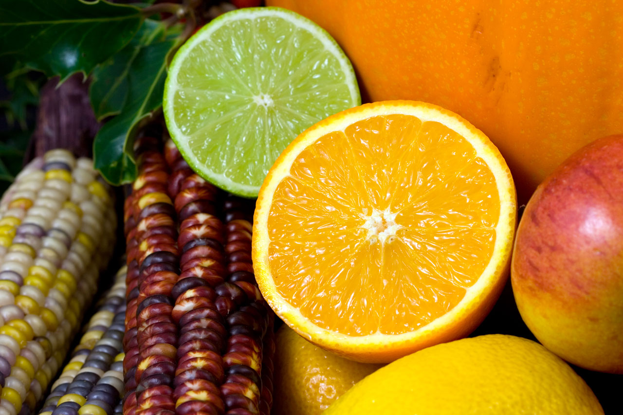 Various fruit (oranges, limes, corn, pumpkin, apple)