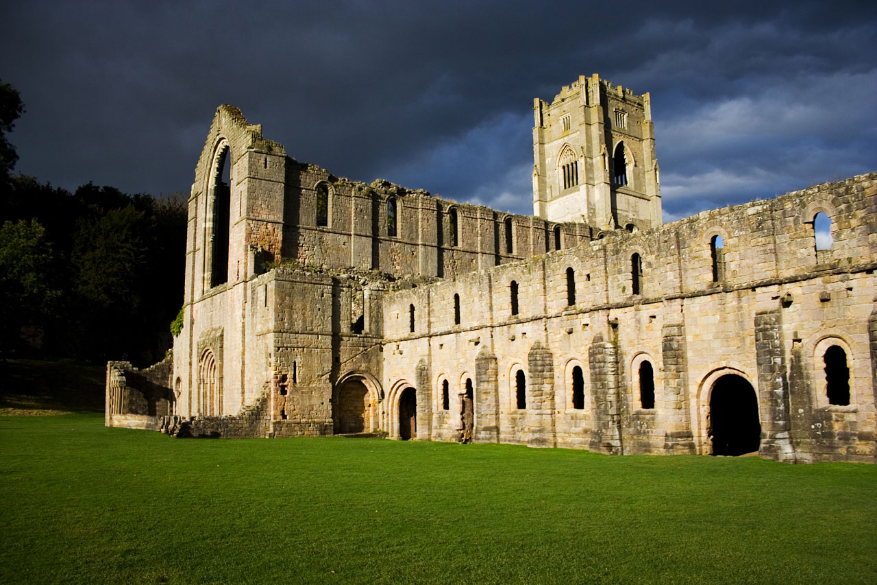 A dramatic picture of Fountains Abbey right before storm