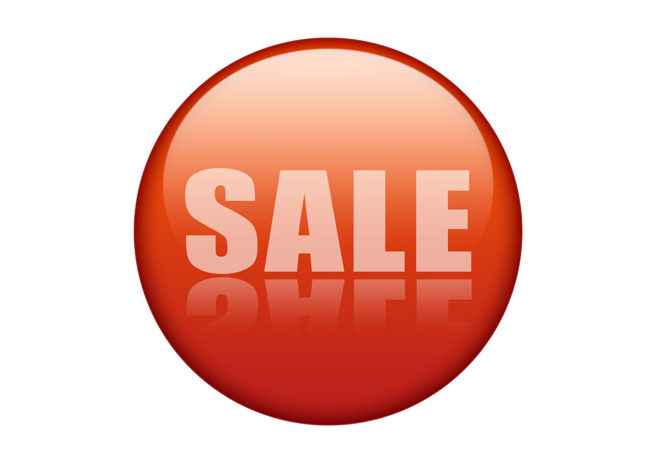 A red sale icon with a reflection