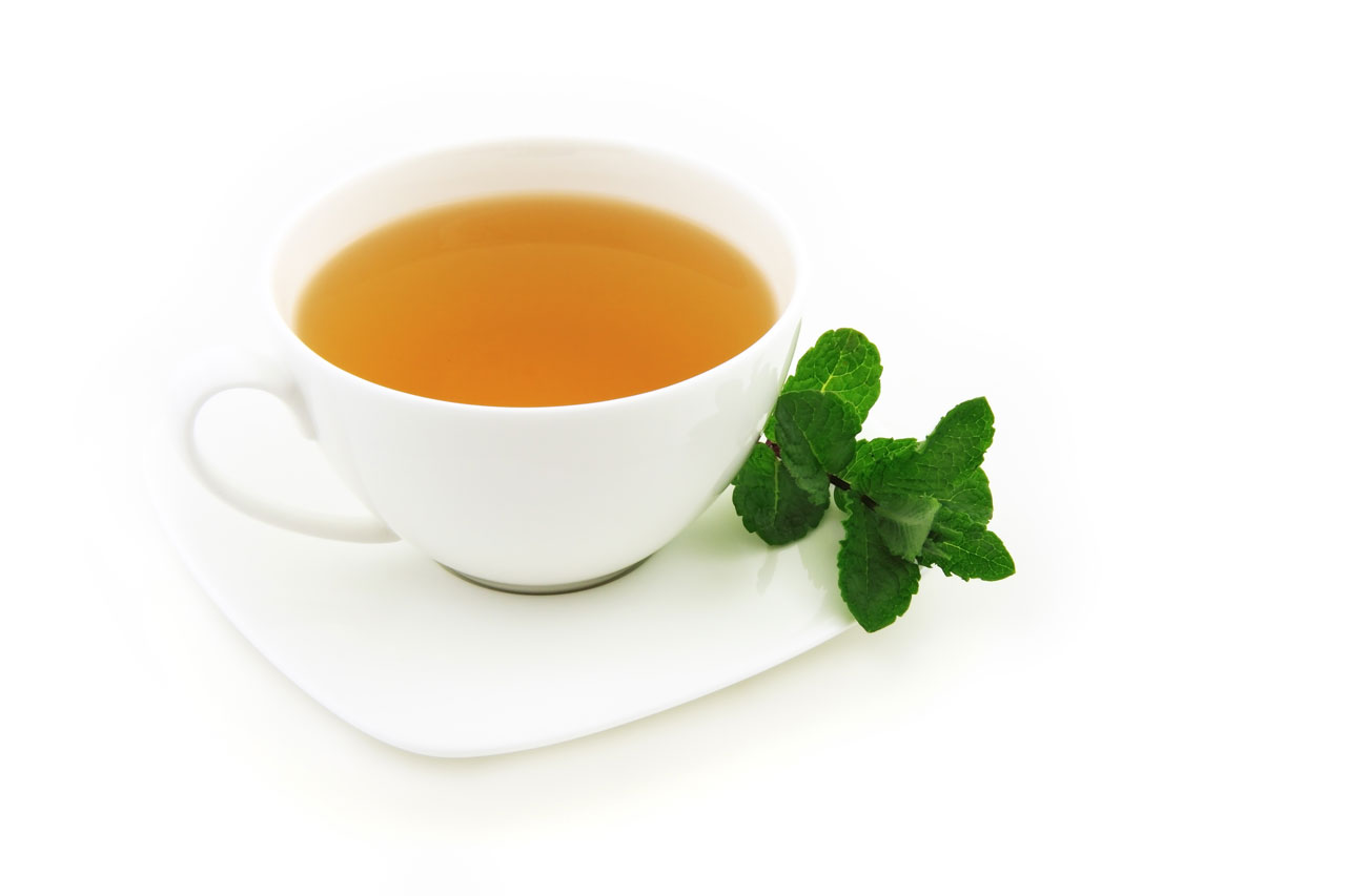 Mint tea on white background