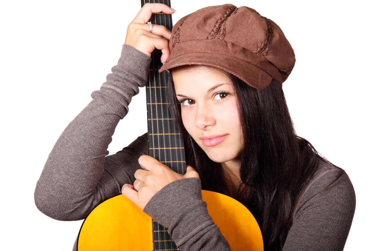 Woman Holding Guitar