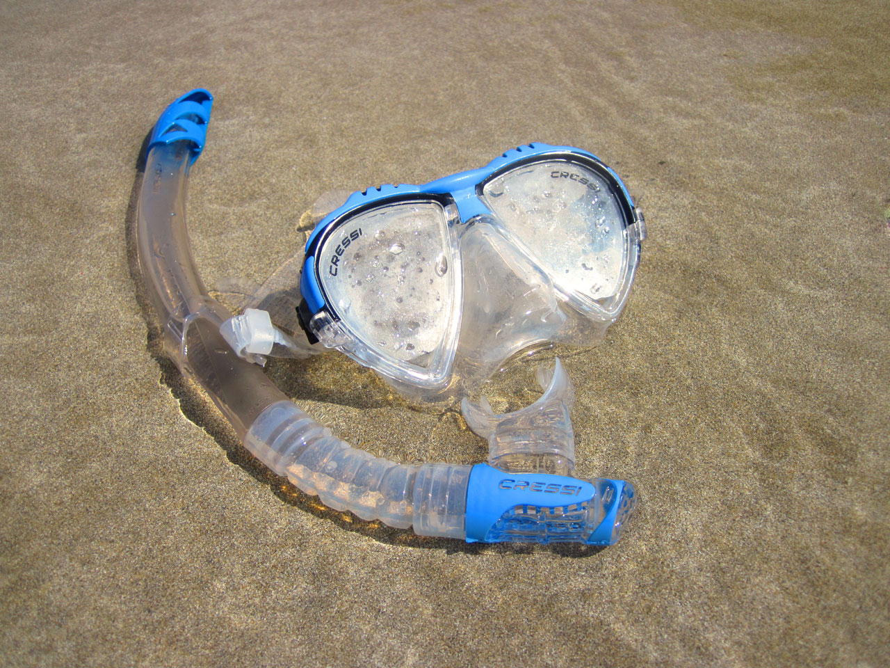 snorkeling mask in sand