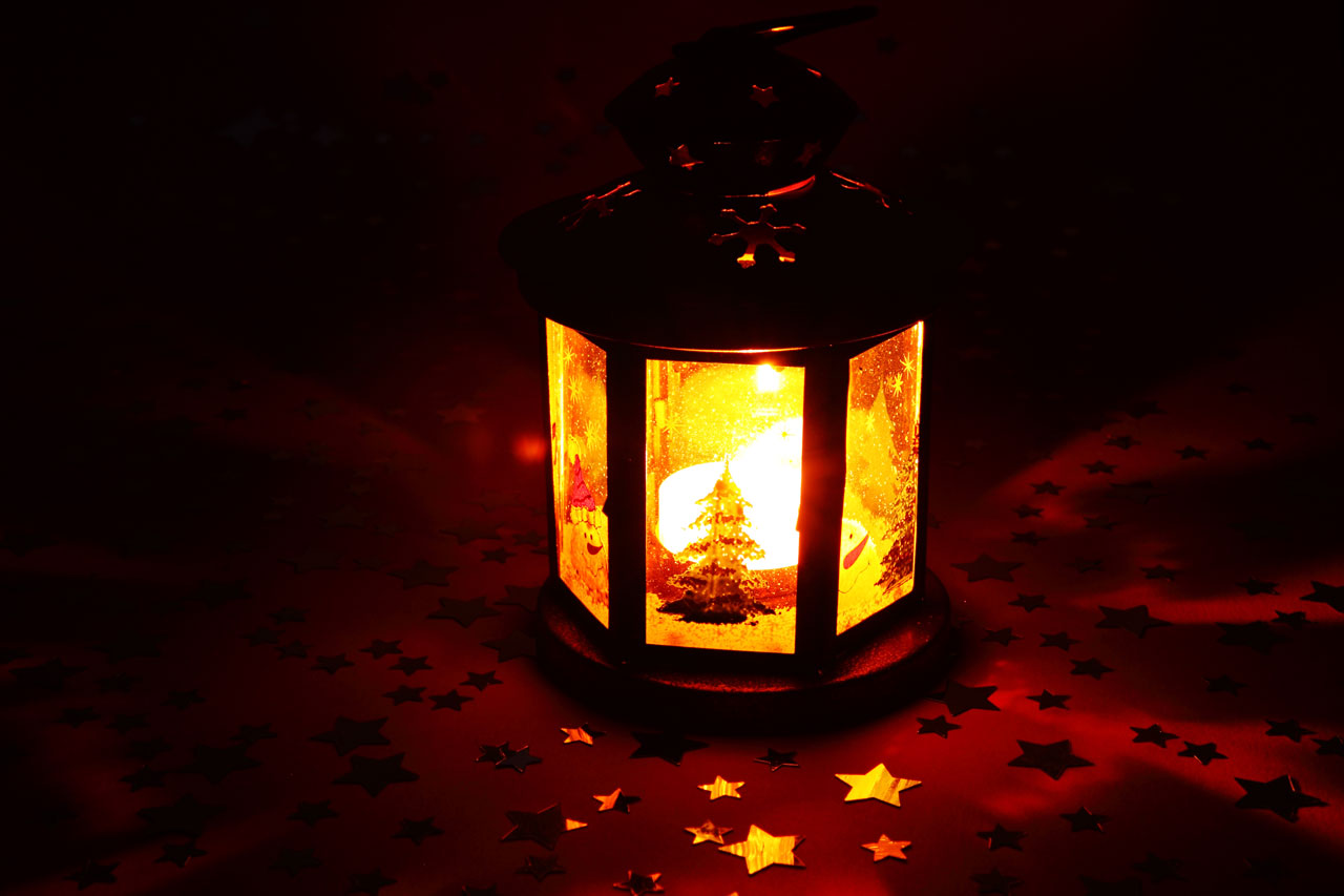 christmas lantern glowing in dark - landscape