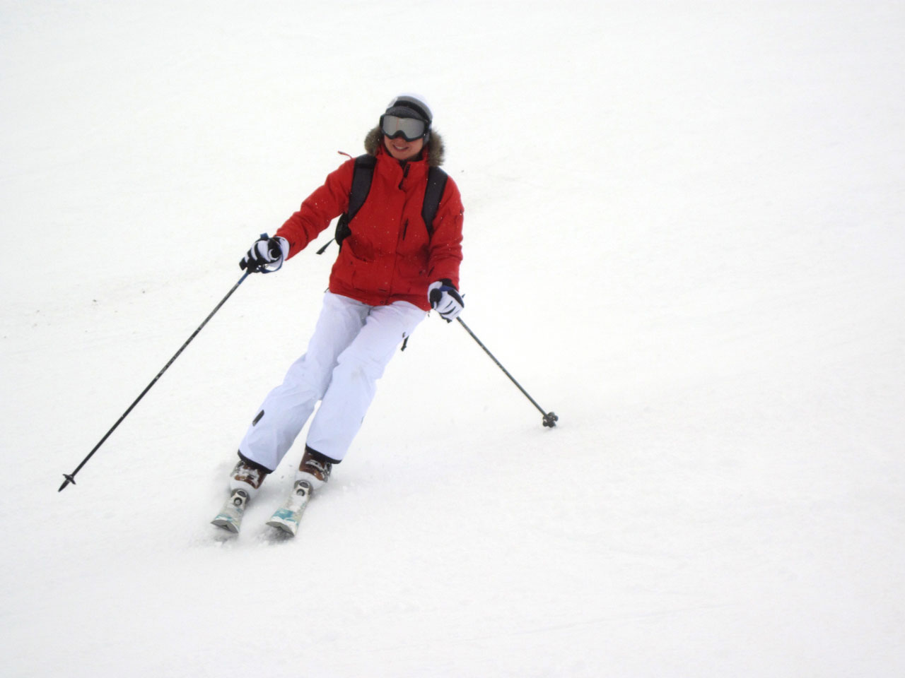 female skier in action on slope