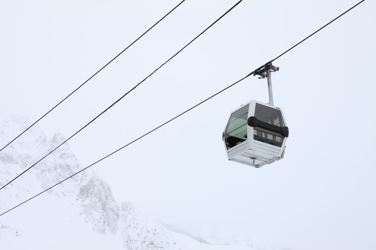 empty cable car with a mountain