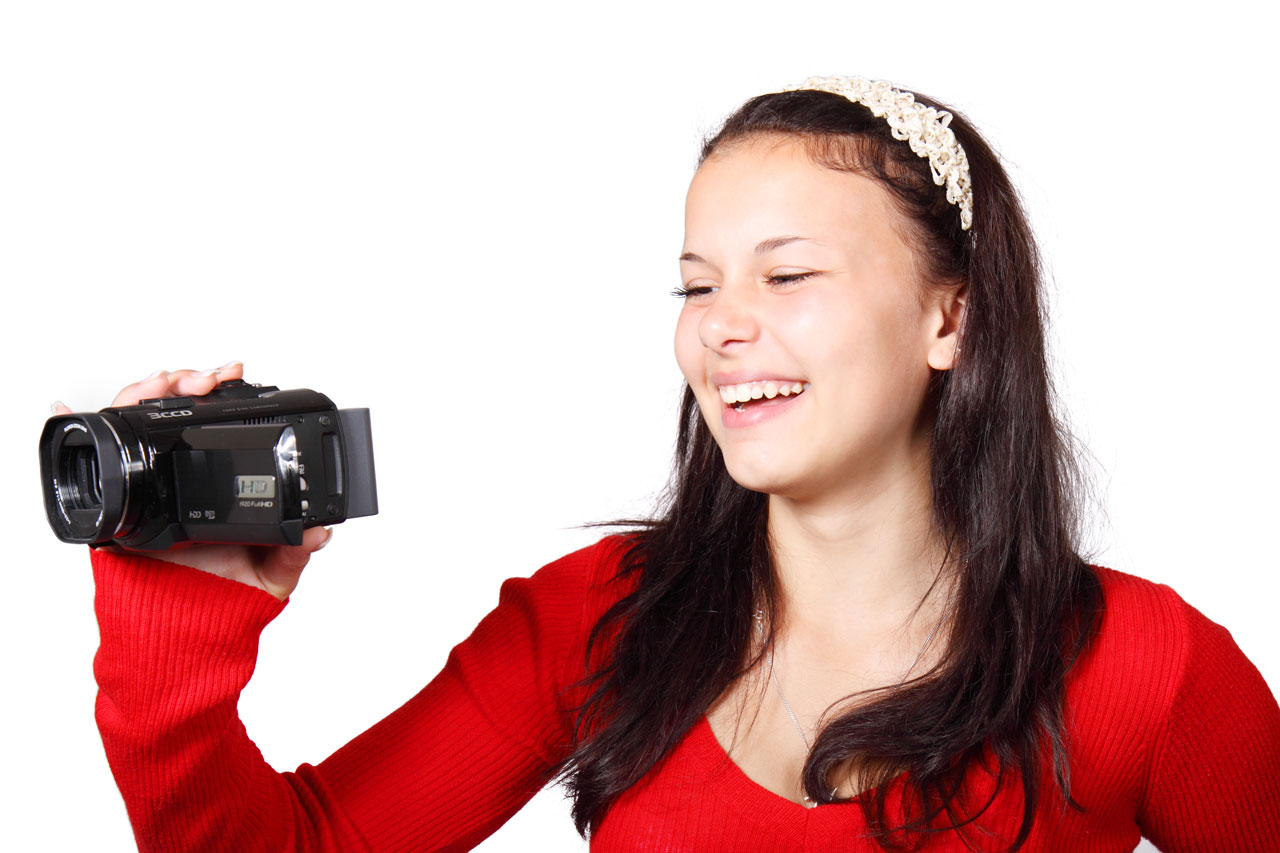 Woman Holding Video Camera