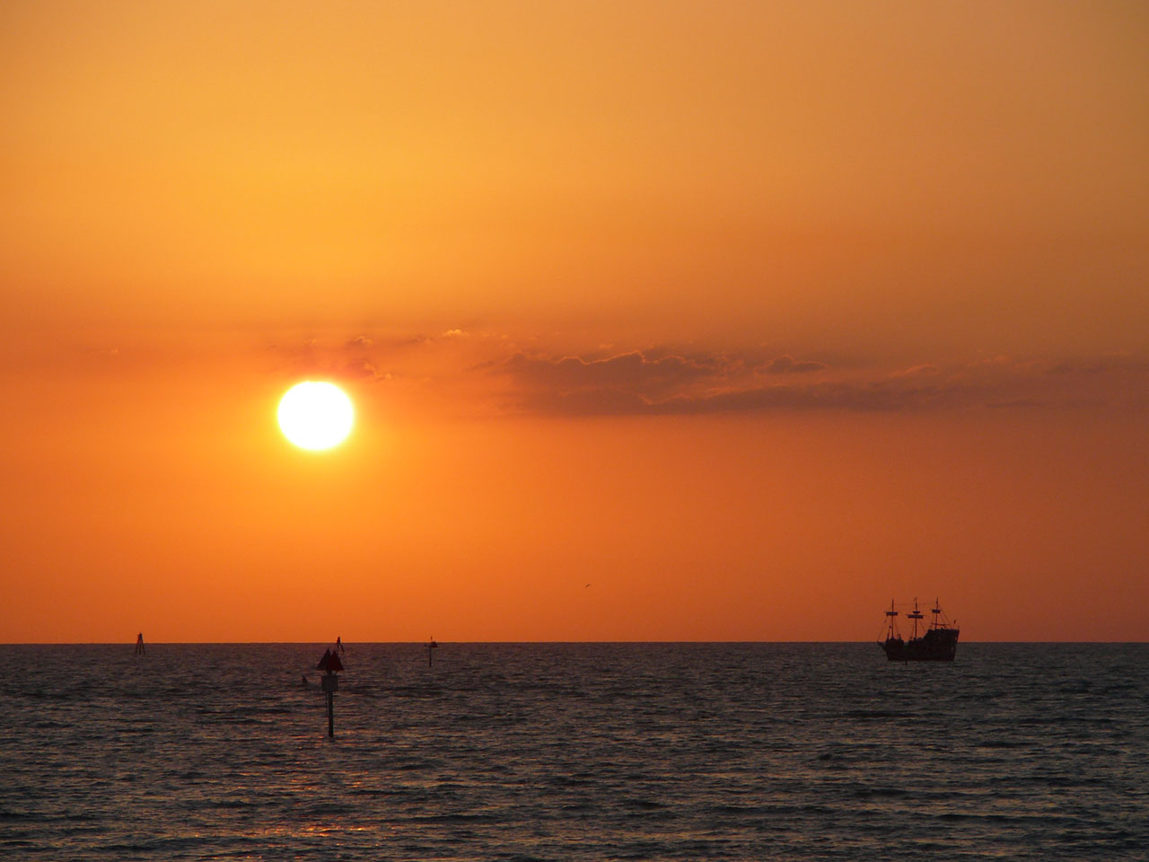 Ship sailing into the sunset