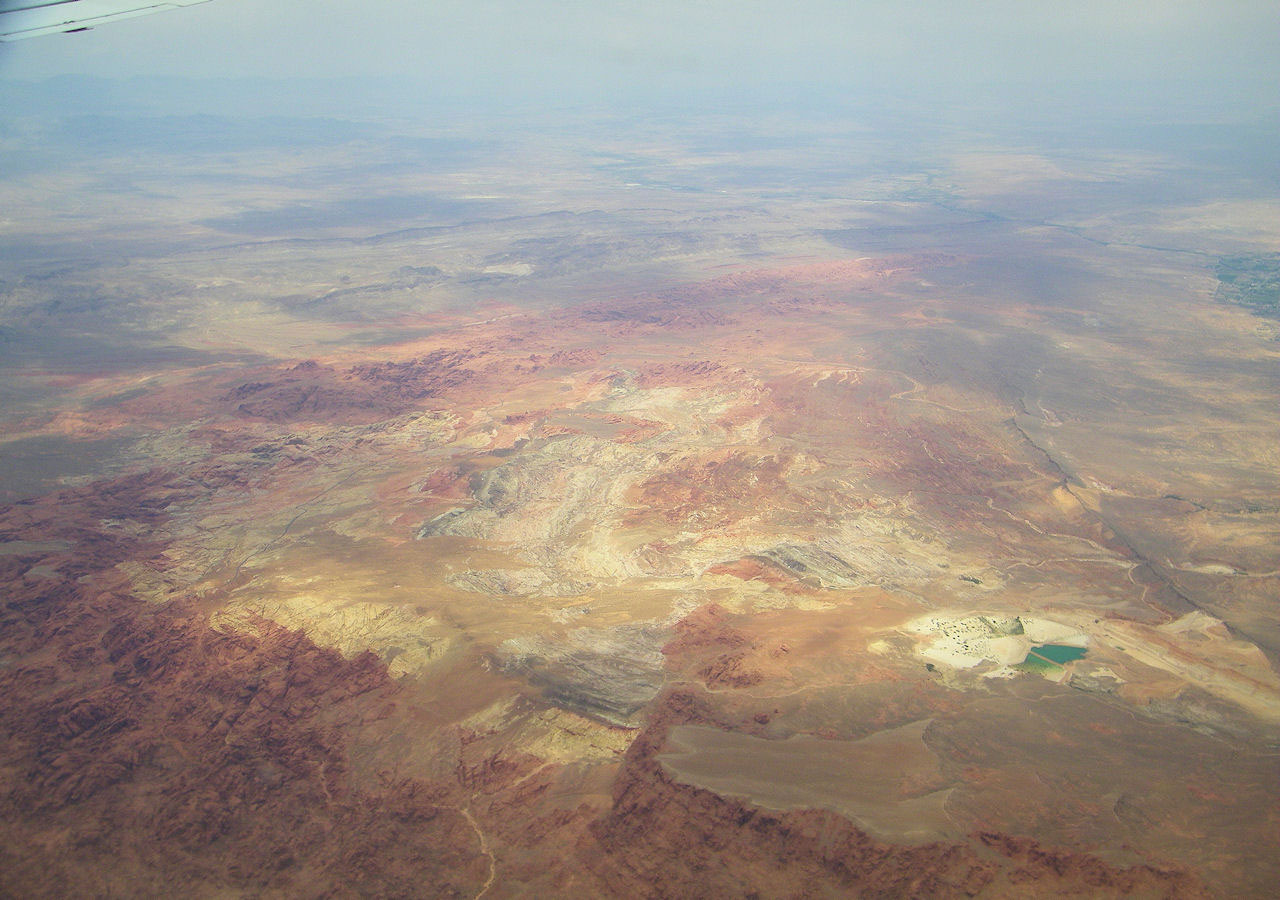 Picture taken of flying over Nevada and looking out the window down at the land.
