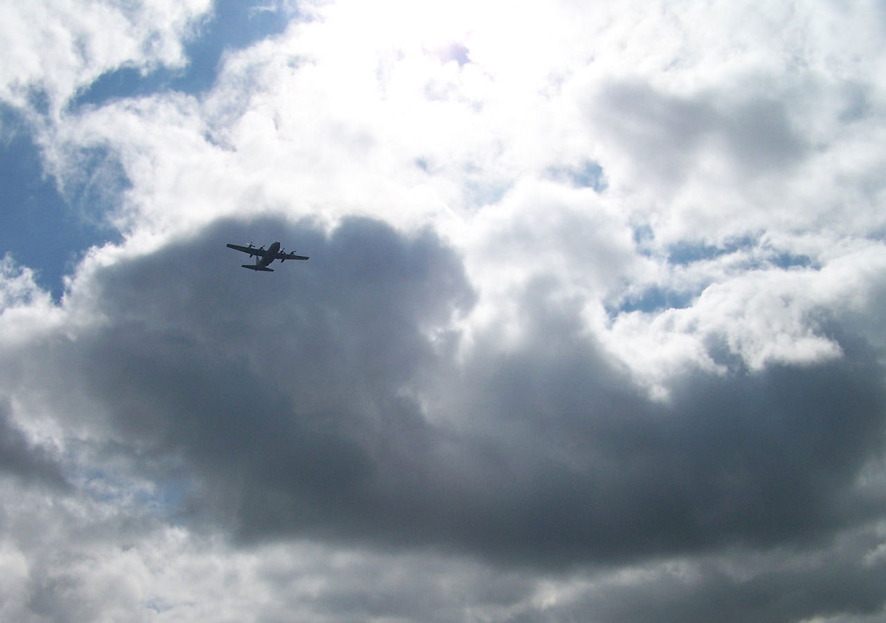 Picture taken at Dover, DE Nascar Race September 2009 of the C130 flyover closer