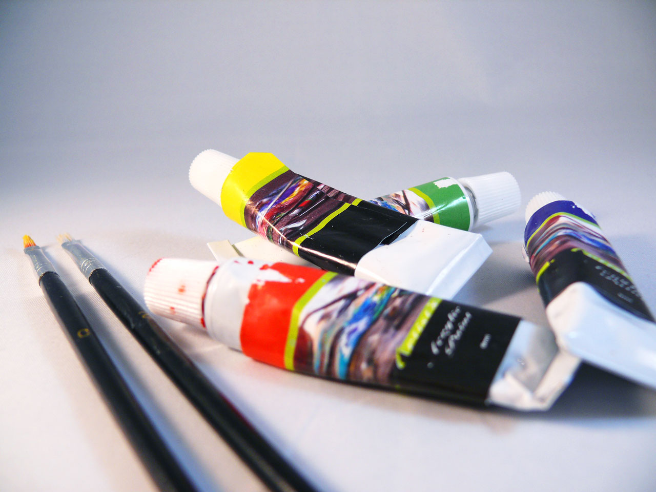Paints, paint brushes