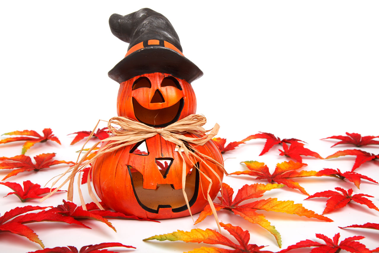 jack-o-lantern halloween decoration with leaves isolated on white background
