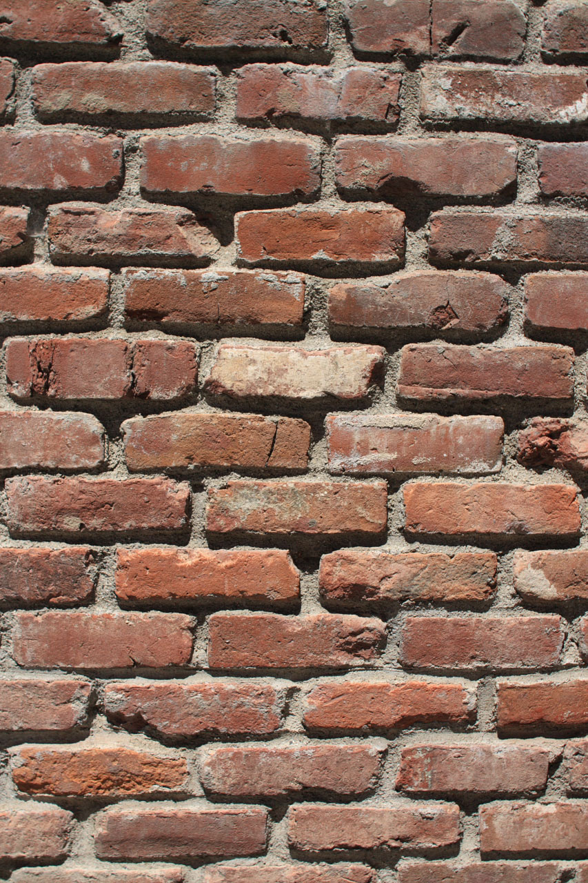 Wall of recycled red clay brick