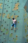 Girl Climbing Wall