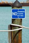 Warning Sign At Marina