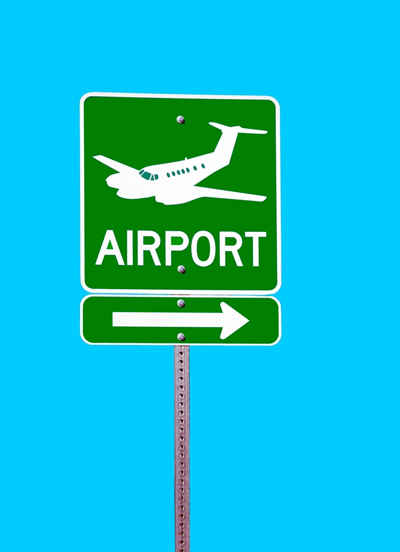 Sign indicating airport in the area