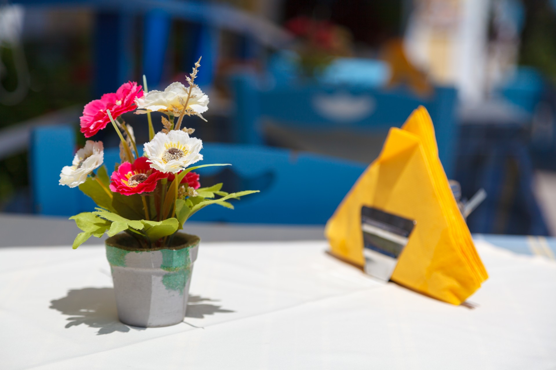 Flowers on a restaurant table in Greece