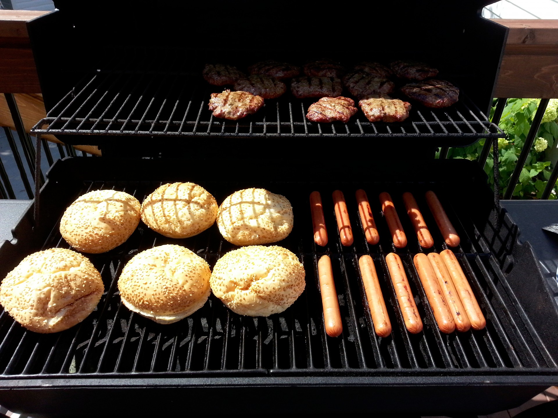 Sausages and Beefburgers on a BBQ