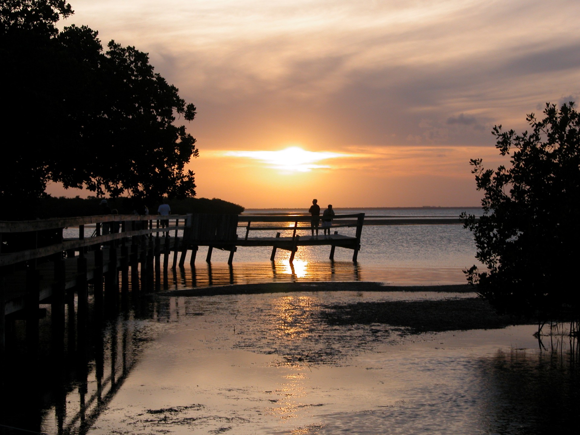 People watching a sunset on crooked pier at key West, Florida
