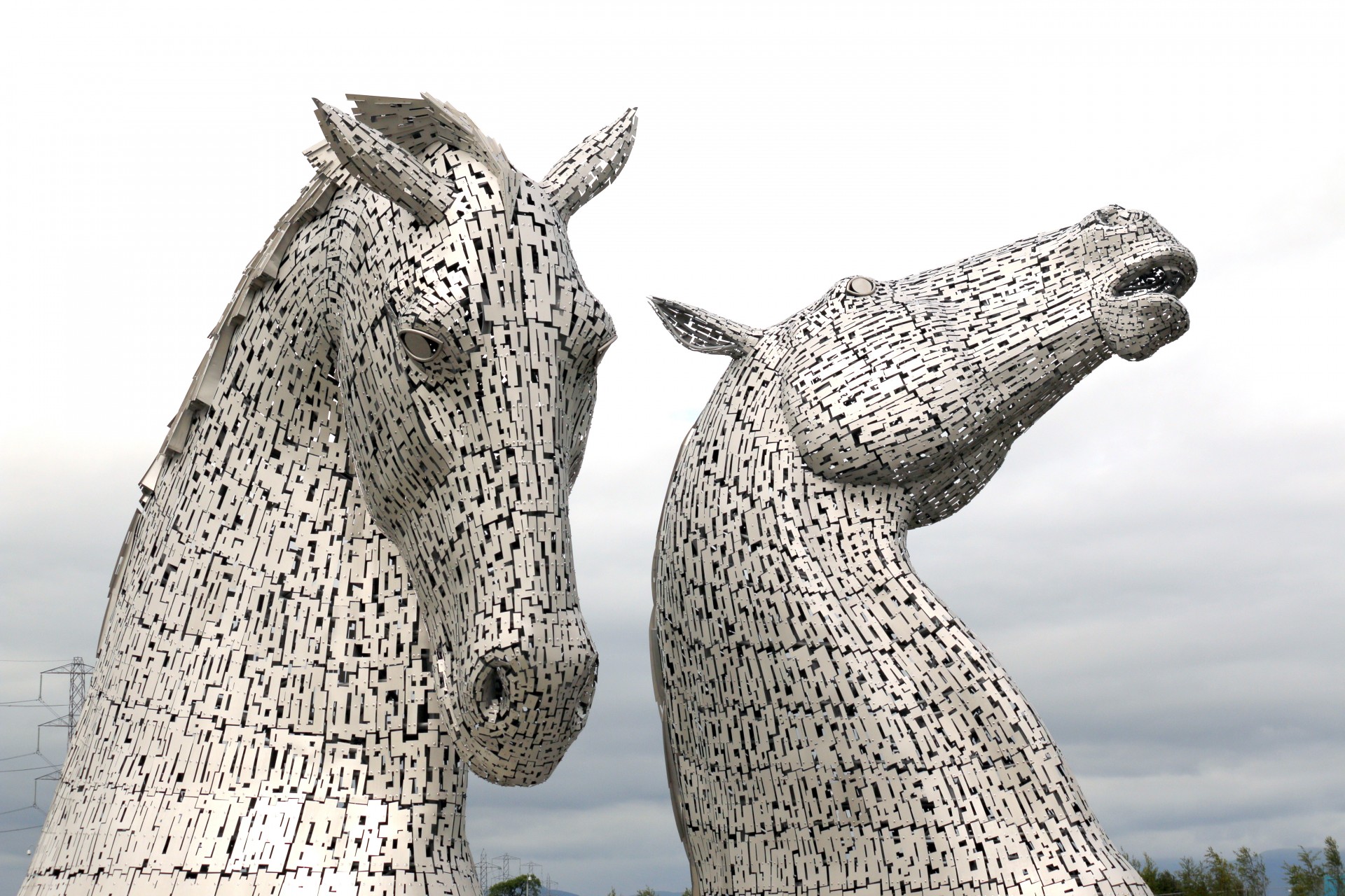 Two horse head statues, located at `The Helix', Falkirk, Scotland.