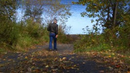 Man On Lake Path
