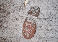 Shoe Imprint On Pavement