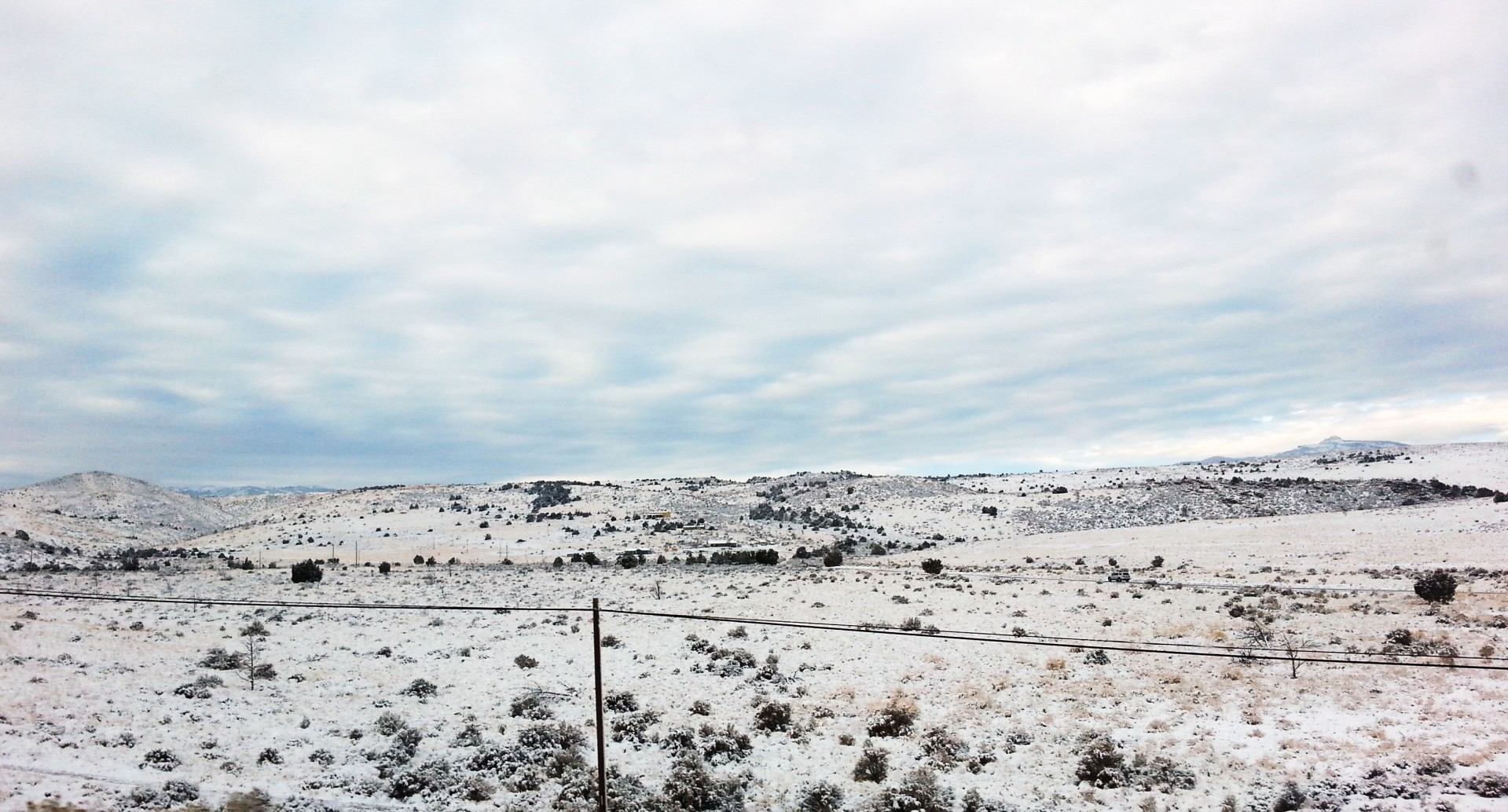 barren land covered with fresh snow