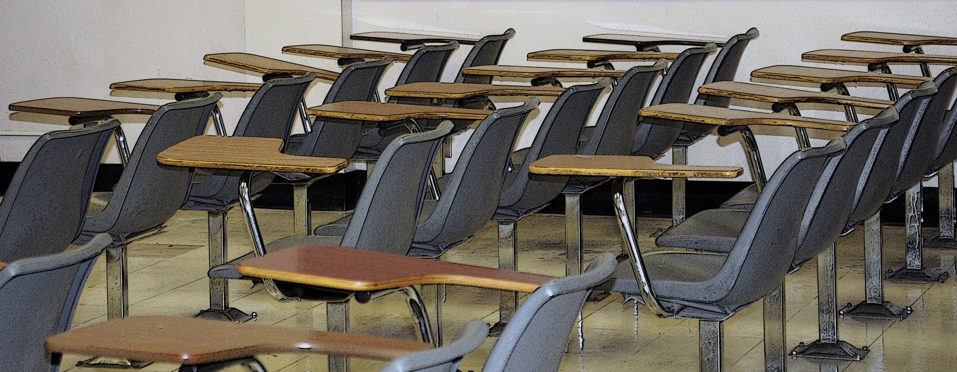 rows of chairs and desk in a classroom