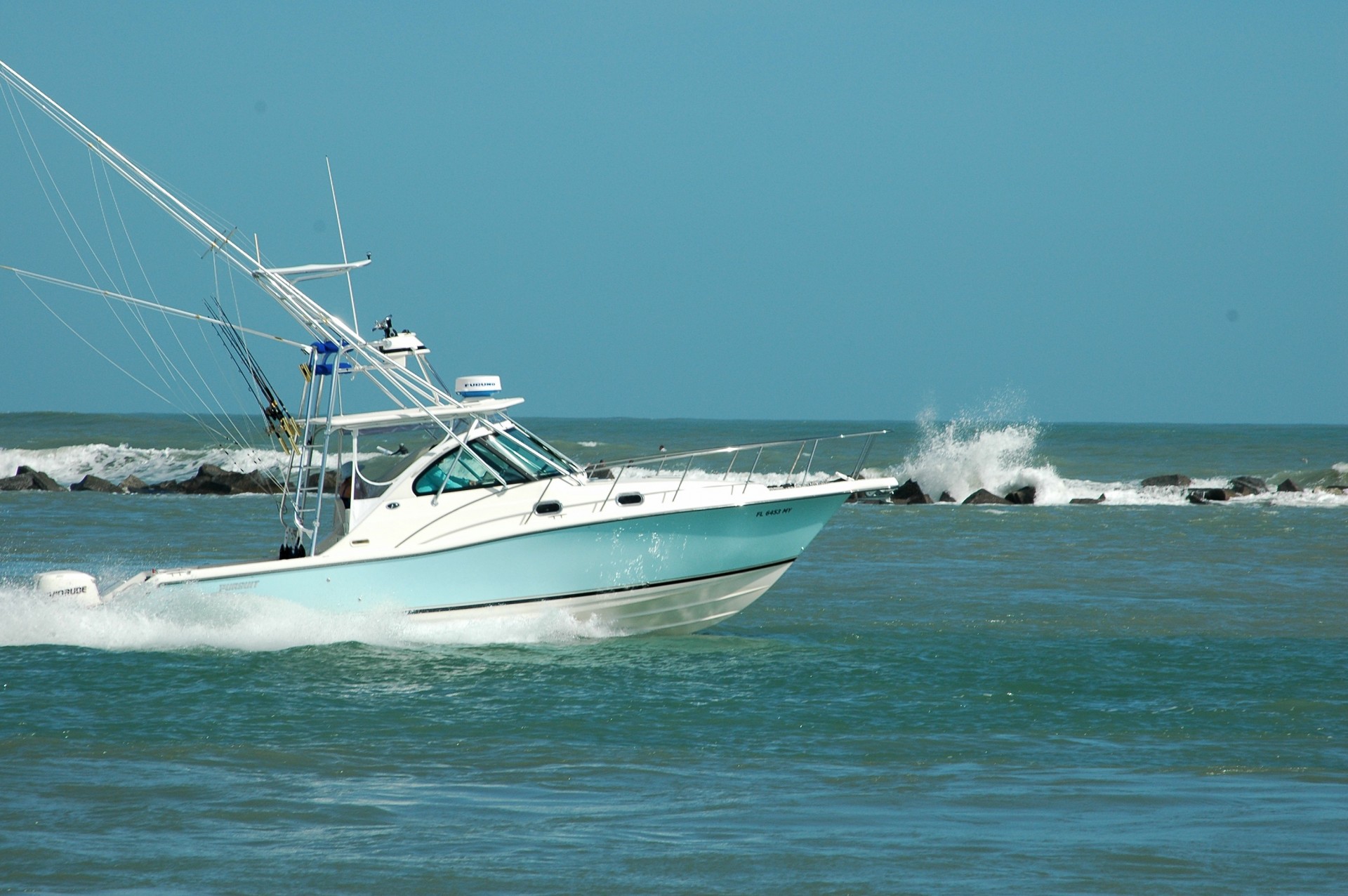 Sport fishing boat heading for the fishing grounds