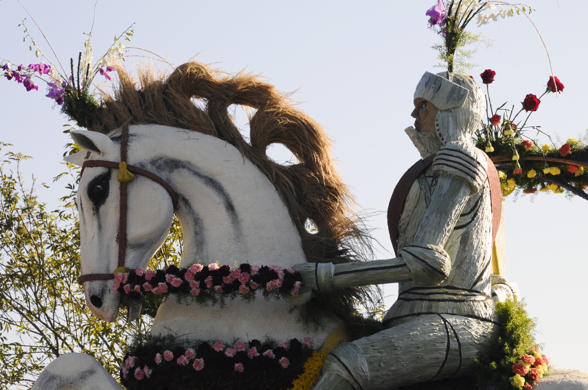 close-up of a beautiful sculpture, from a Rose Bowl float of a knight in white on a horse.