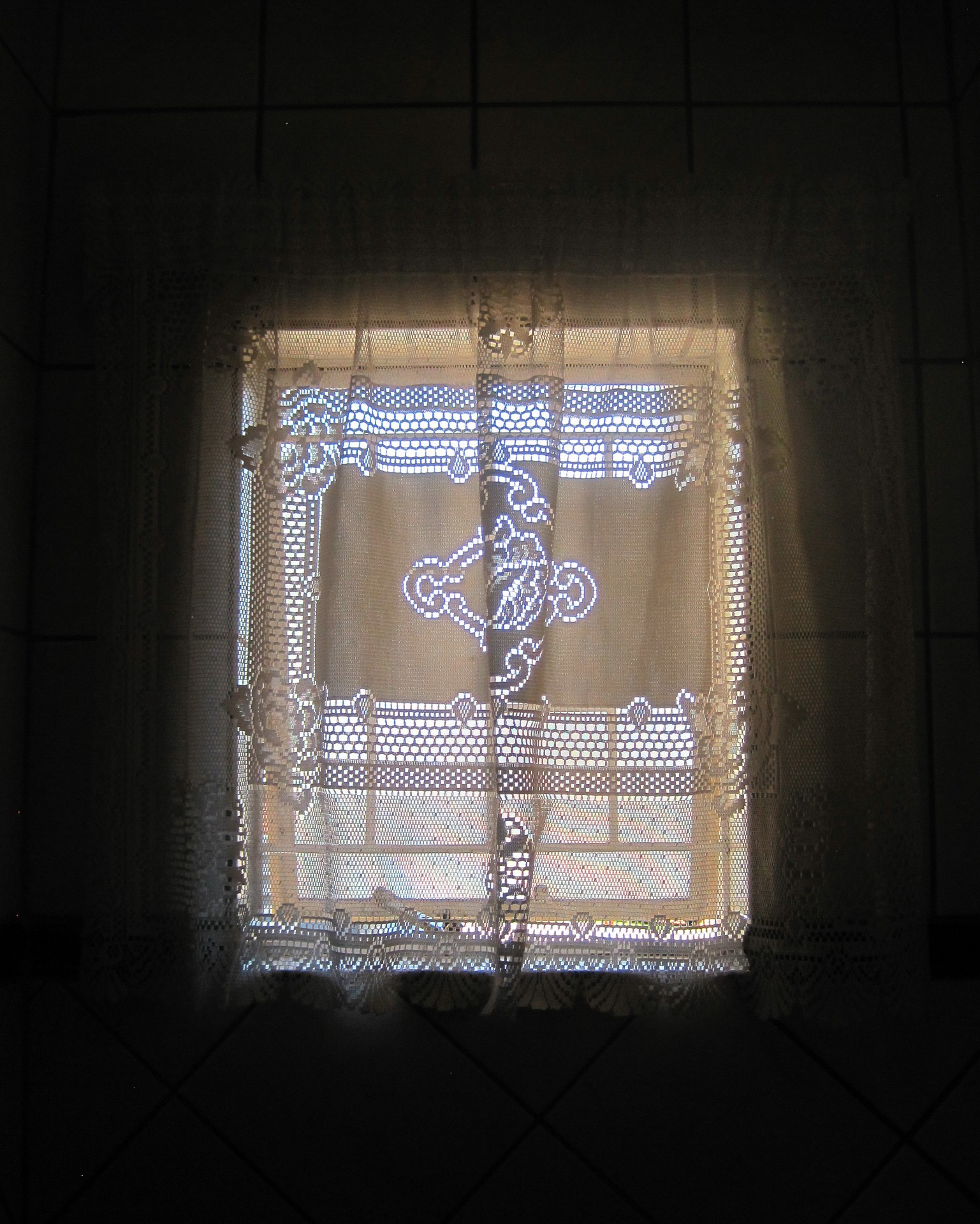 window with lace curtain