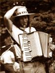 Musician With Accordion & Smile