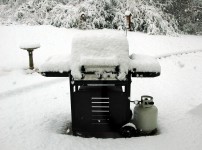 Snow Covered BBQ Grille