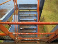 Stairs And Orange Railing