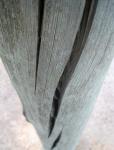 Twisted Cracks In Wooden Pole