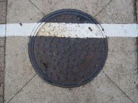 White Line Painted Over Manhole