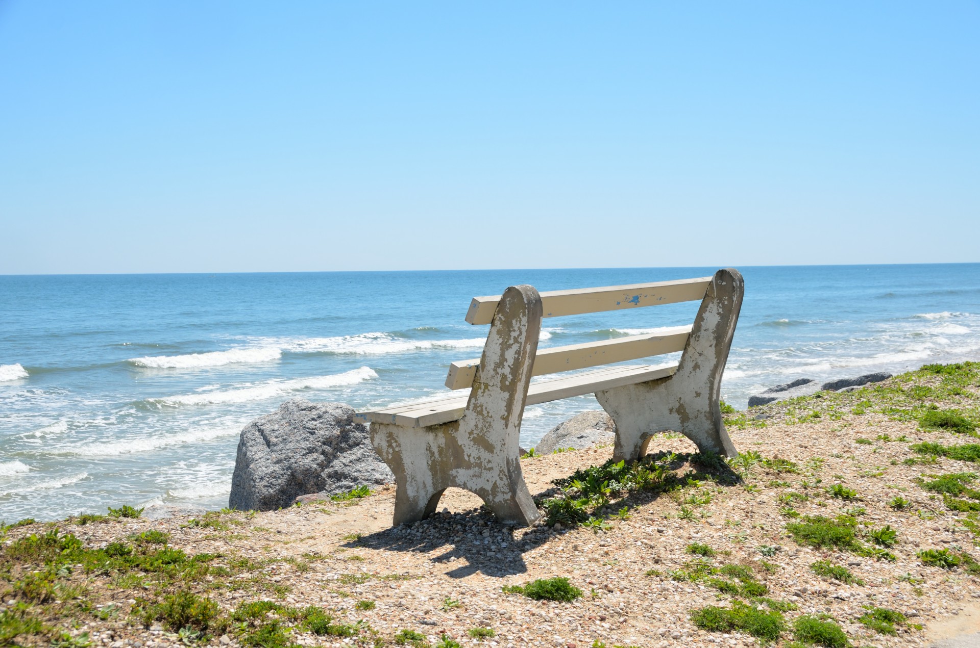 Bench seat over looking the ocean beach
