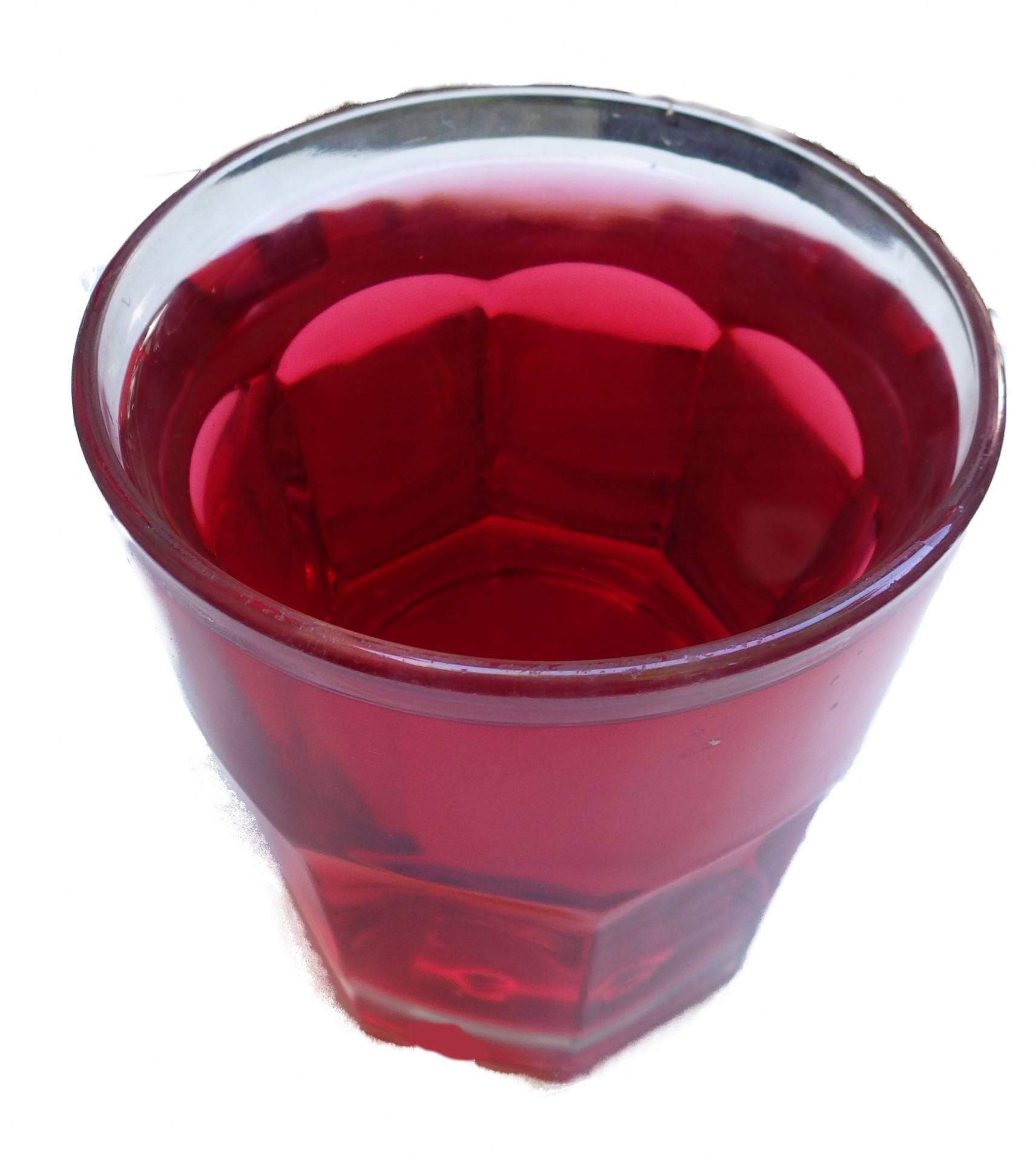 cranberry juice in glass isolated on white background