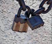 2 Padlocks With Textured Background