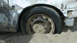 Car Wheel Stuck  In Sand
