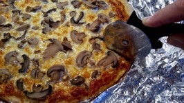 Cutting Mushroom Pizza