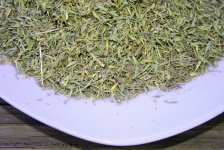 Dried Herbs On White Plate