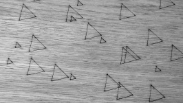 Triangles On Gray Background