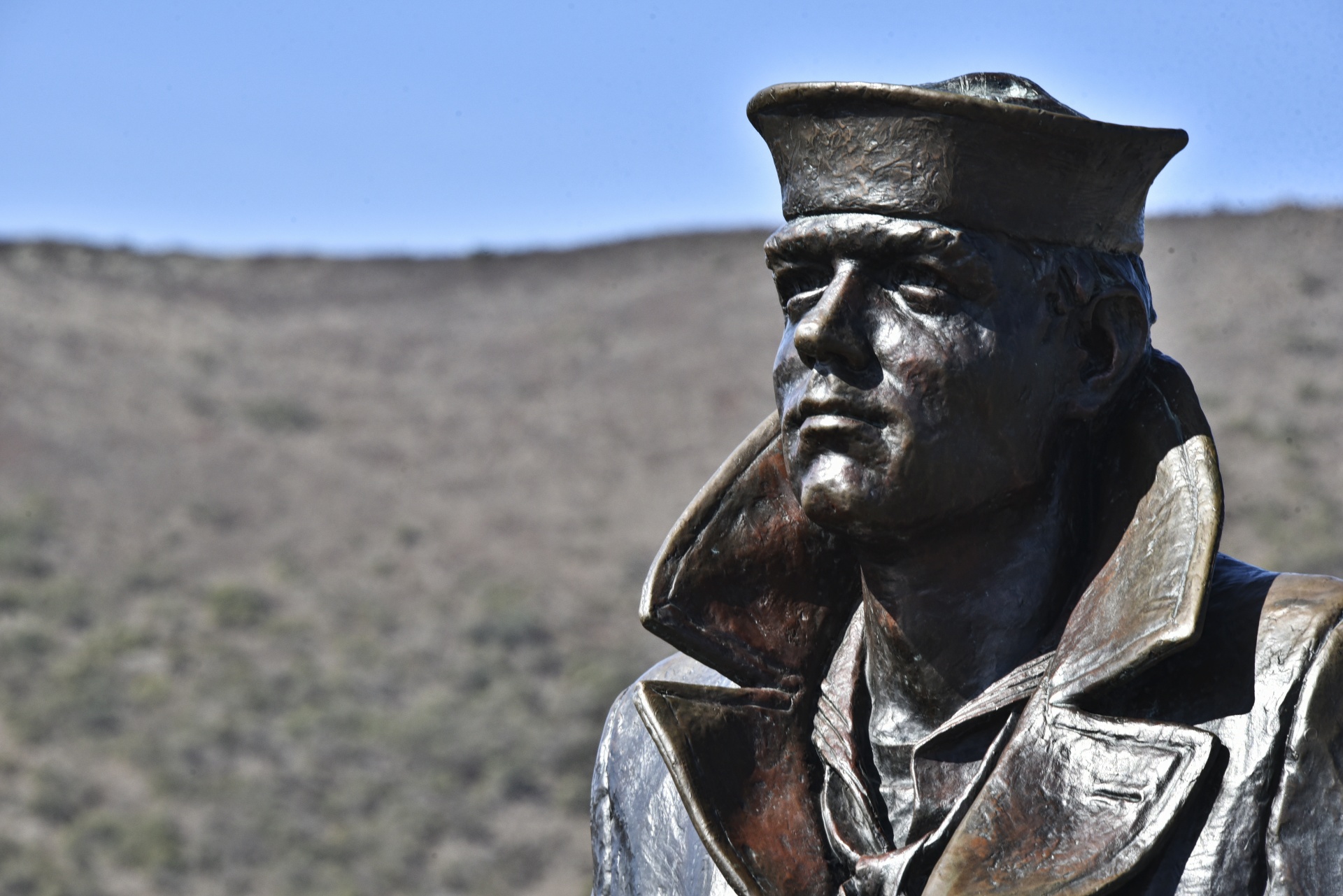 Closeup of the face of the Lone Soldier statue