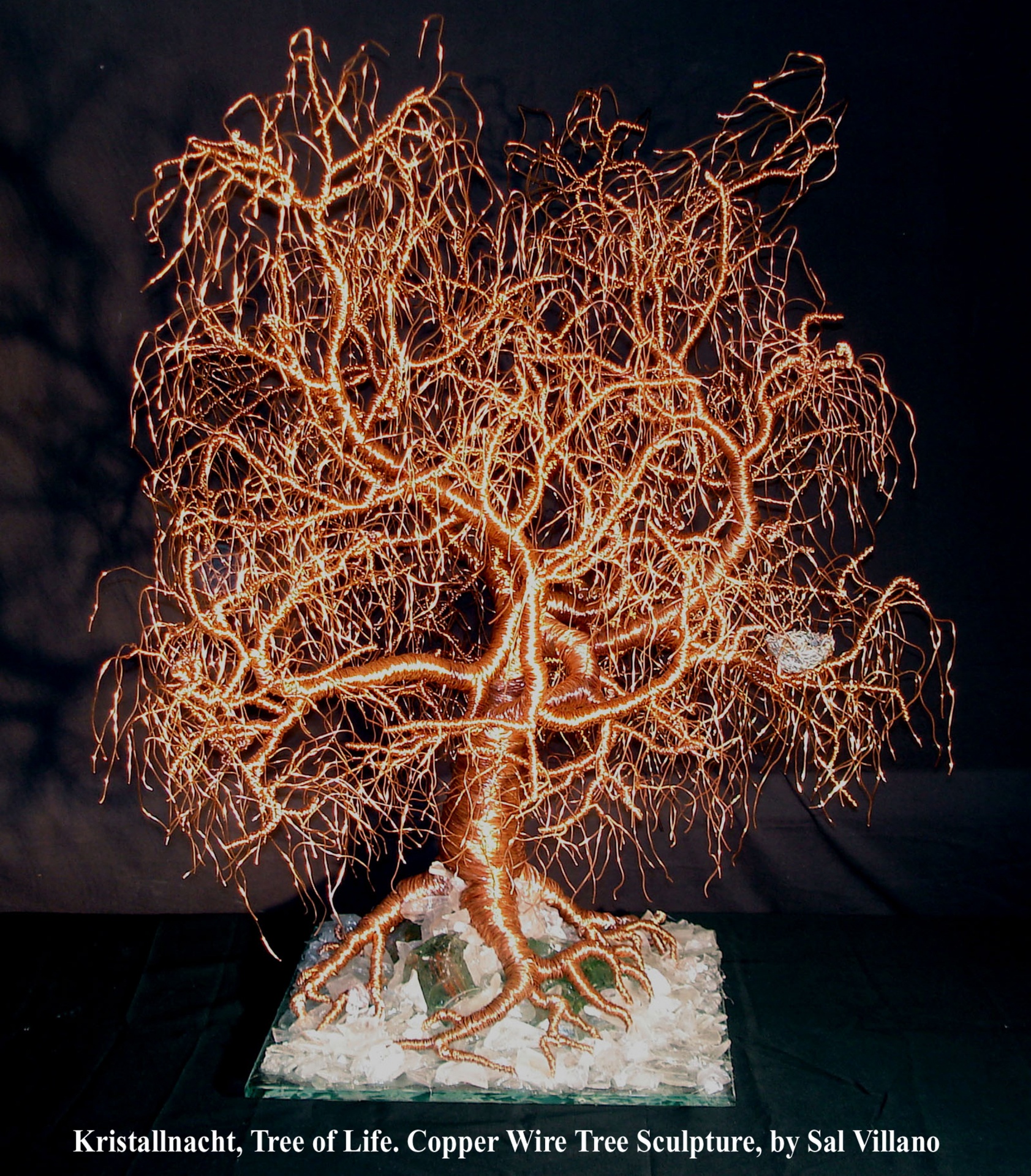 Kristallnacht, Tree of Life, wire tree sculpture Kristallnacht, or The Night of Broken Glass, was a series of government-sanctioned attacks against the Jewish population of Germany and Austria